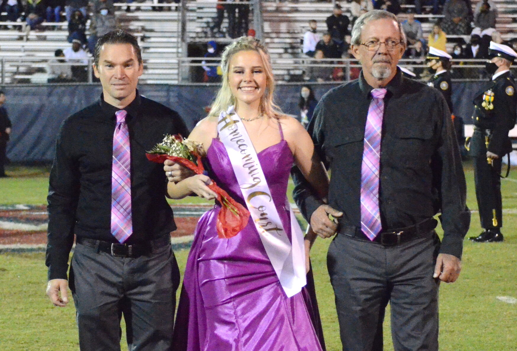 Whitney Farmer escorted by father Phillip Farmer and step-father Paul Martin.jpg
